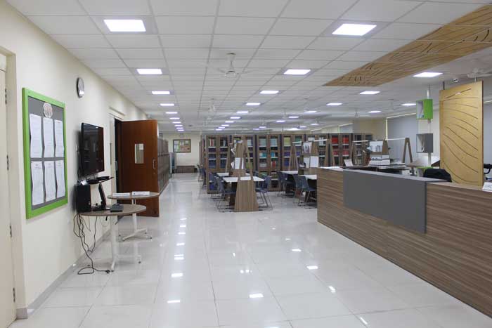 Modern library space with natural light and study spaces